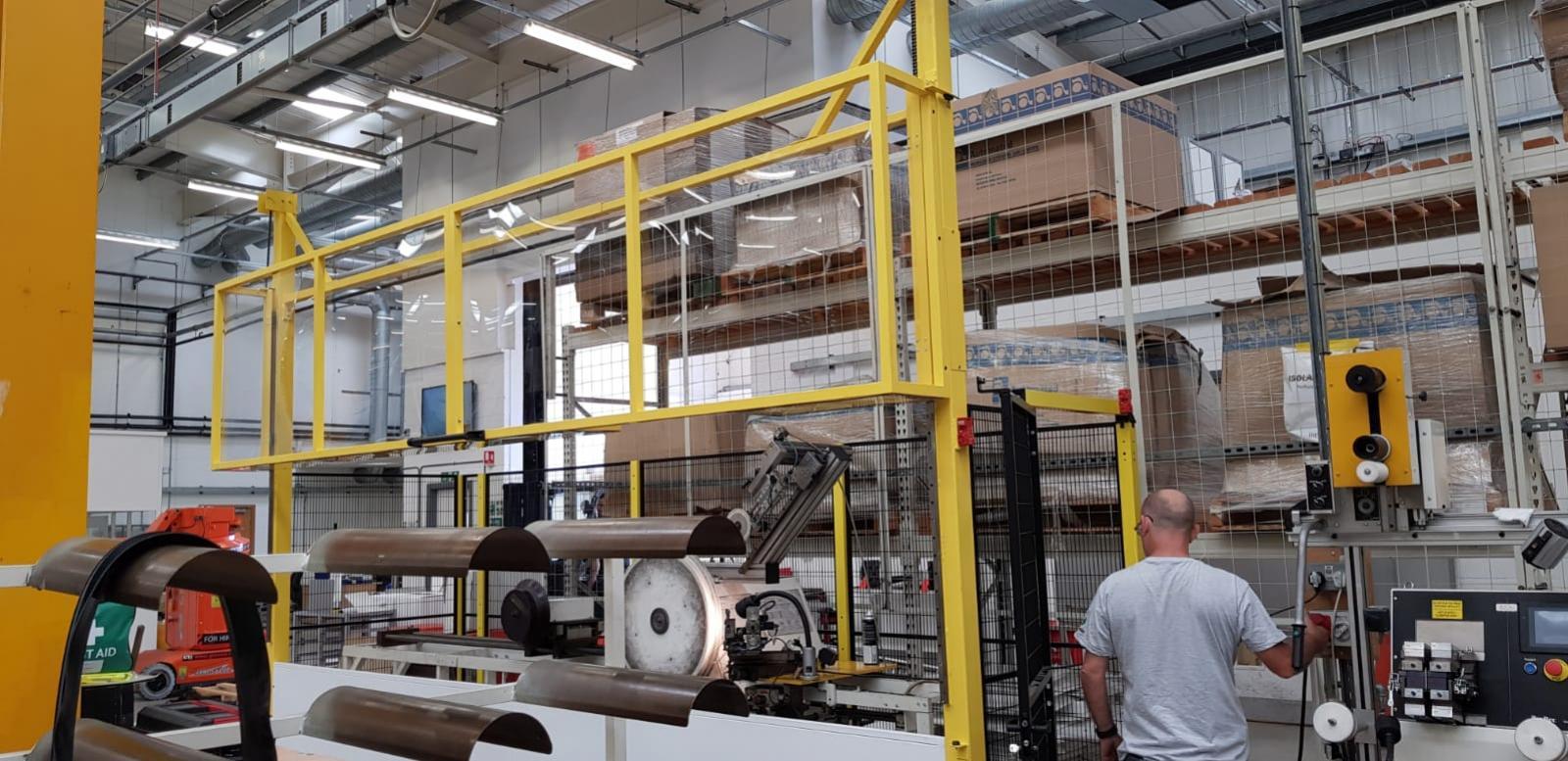 Rise and fall door with rear access fencing 