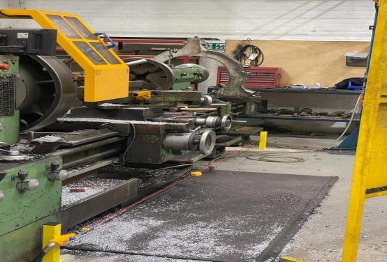 Lathe safety kick wire